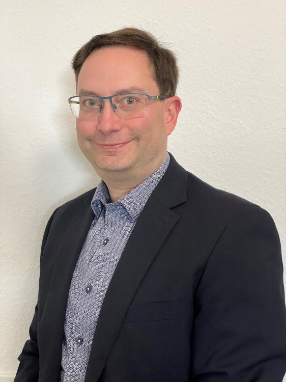 Headshot of Laurent J