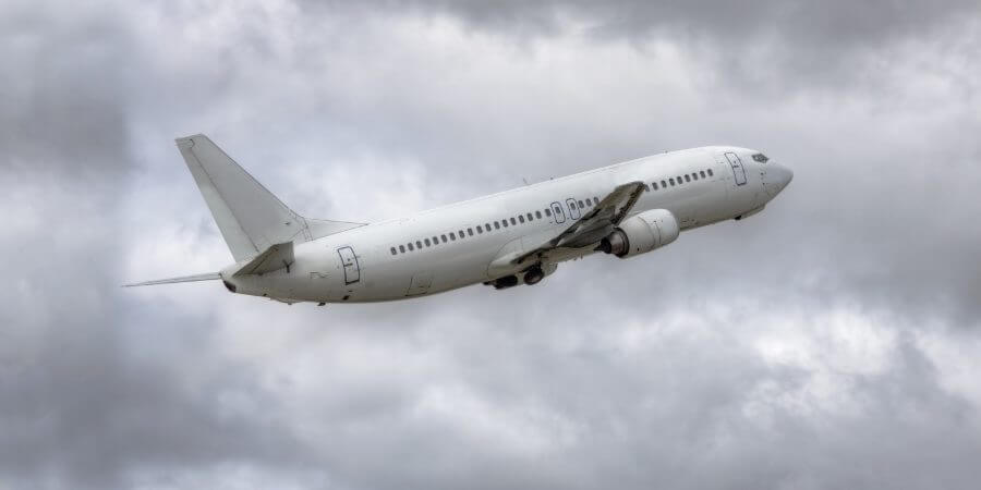 Aircraft against a stormy sky during hurricane season