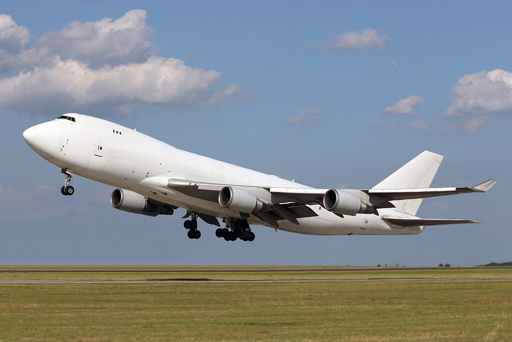 wide-body cargo airplane take off
