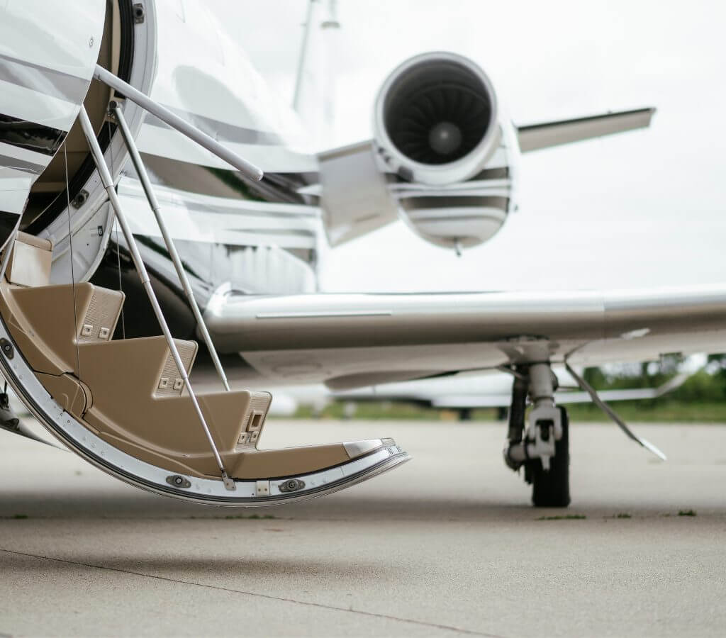 stairs to private jet aircraft 