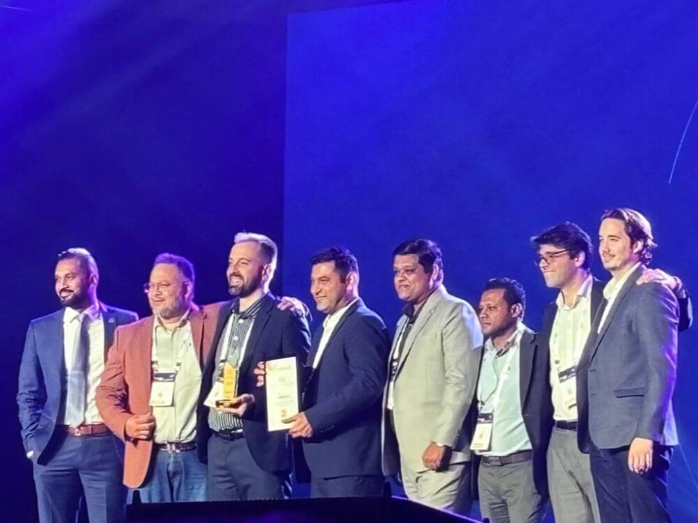 Chapman Freeborn receiving the STAT Times Award