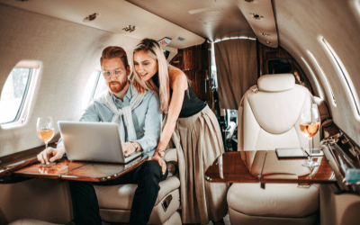 Couple island hopping on a private jet