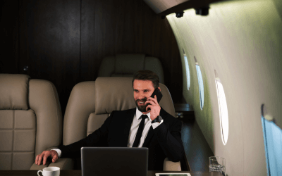 Businessman flying on a private jet.
