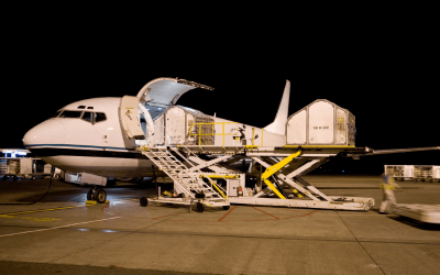 Cargo being lifted into an aircraft