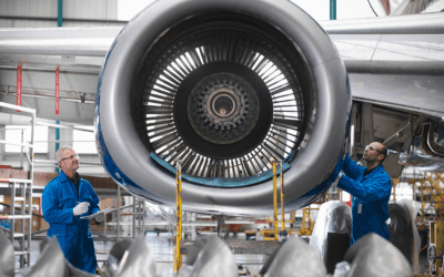Engineers assembling aircraft