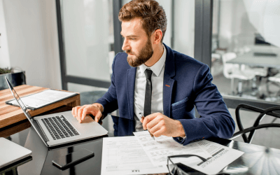 Business Professional with Laptop: Ordering Urgent Cargo Charters