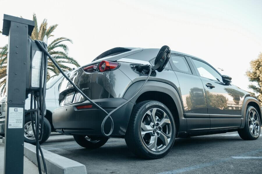 Customer charging electric vehicle