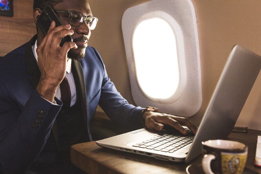 Businessman enjoying the benefits of business jet travel in Africa.