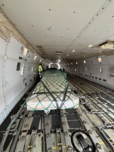 Oversized cargo loaded inside Boeing 747 freighter during heavy air cargo charter from Belgium to China