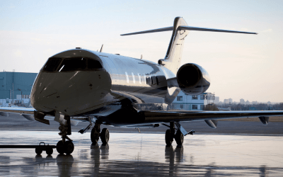 Luxury business jets parked in exclusive hangar at APAC private airport (FBO)