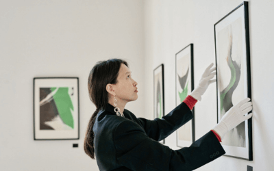 Art handler in gallery