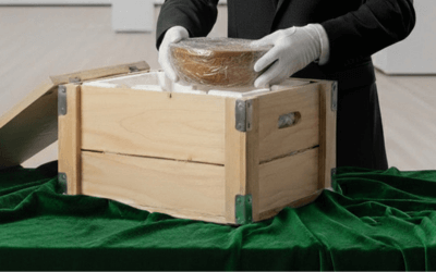 Luxury goods dealer coordinating private jet shipment of fine jewellery and wine