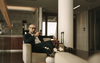 Businessman relaxing in luxurious airport lounge waiting for private jet