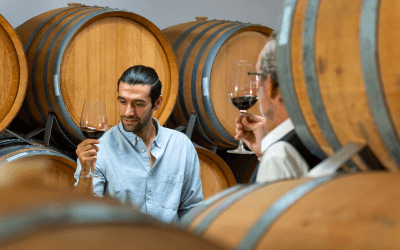 Sommelier inspecting rare wine before private jet shipment to global destinations