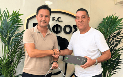 Pafos FC CEO and Chapman Freeborn Charter Broker Anestis Konstantinidis shake hands after the successful flight cooperation.